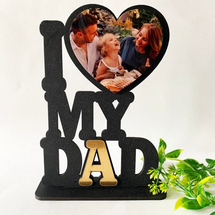 A 6x8 inch tabletop decoration with "I ❤️ DAD" text. Made from high-quality MDF material. Features a stylish design, perfect for Father's Day gifts or home decor. Includes free shipping and dispatches in 2 days.